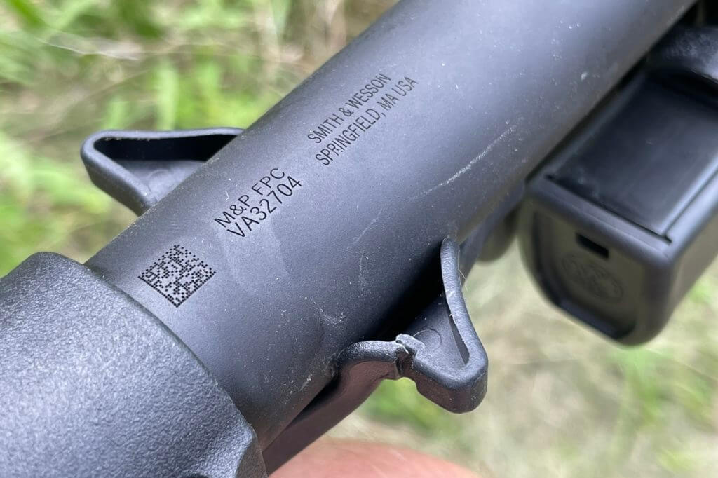 Cracked charging handle which is still functional, yet should be replaced as the crack will get bigger over time