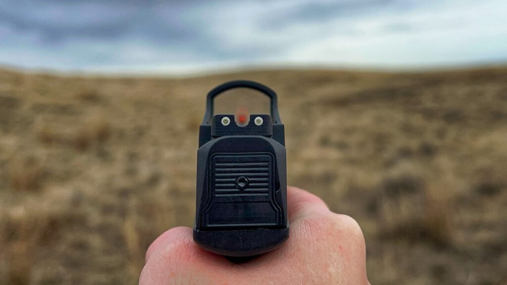 Kimber R7 MAKO with red dot looking out at range