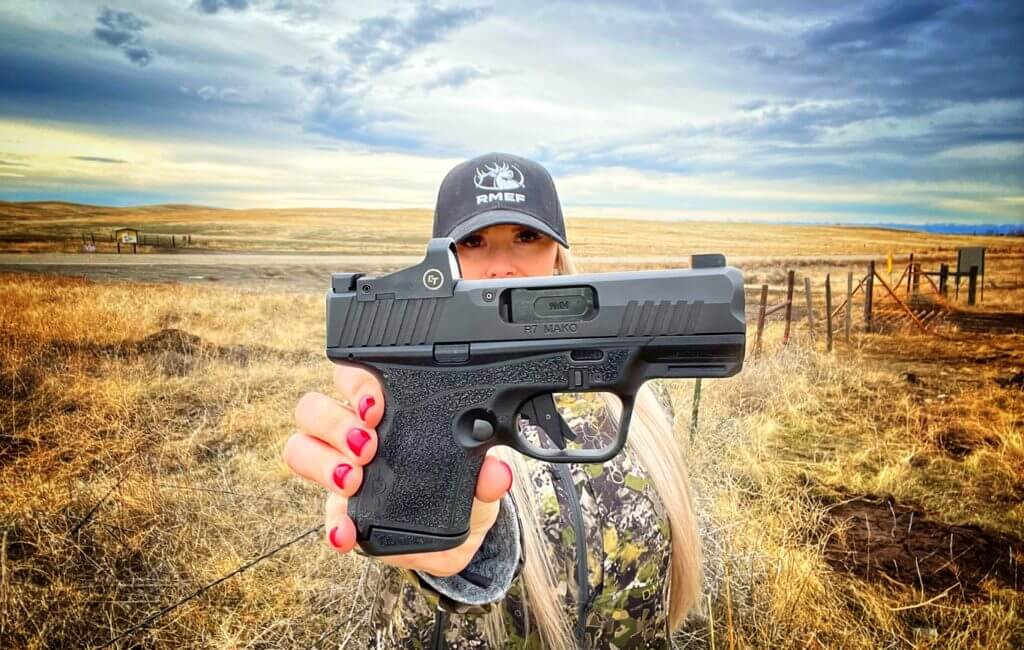 Kimber R7 Mako at the range with cloudy sky in background