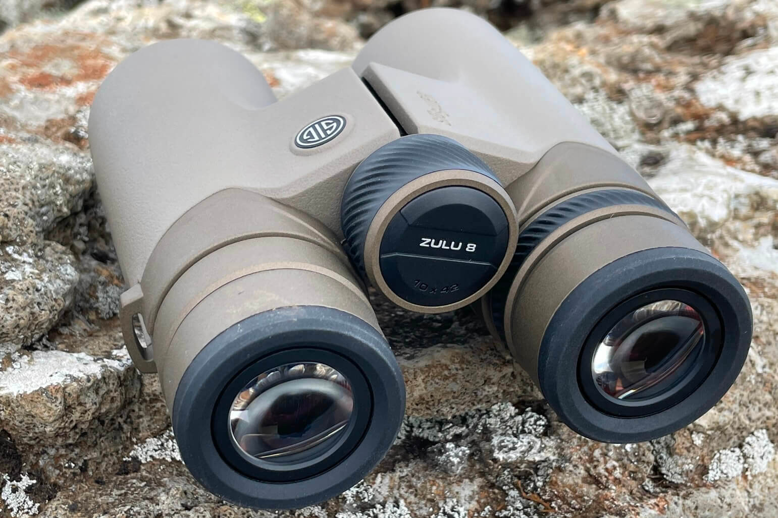 SIG SAUER ZULU8 HDX Binoculars focus ring angle on lava rock