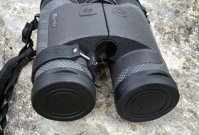 Laser Rangefinder binoculars on rock