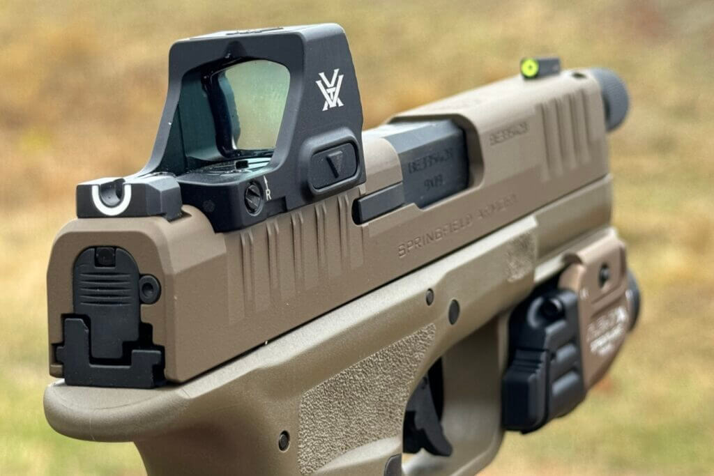 high-visibility tritium and luminescent front sight and a U-notch "tactical rack" rear sight