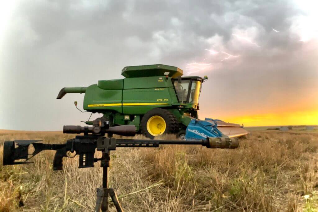 Thunderstorm rolling in during wheat harvest