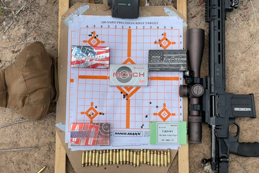 Each box of ammunition is placed next to the group I got shooting from 100 yards