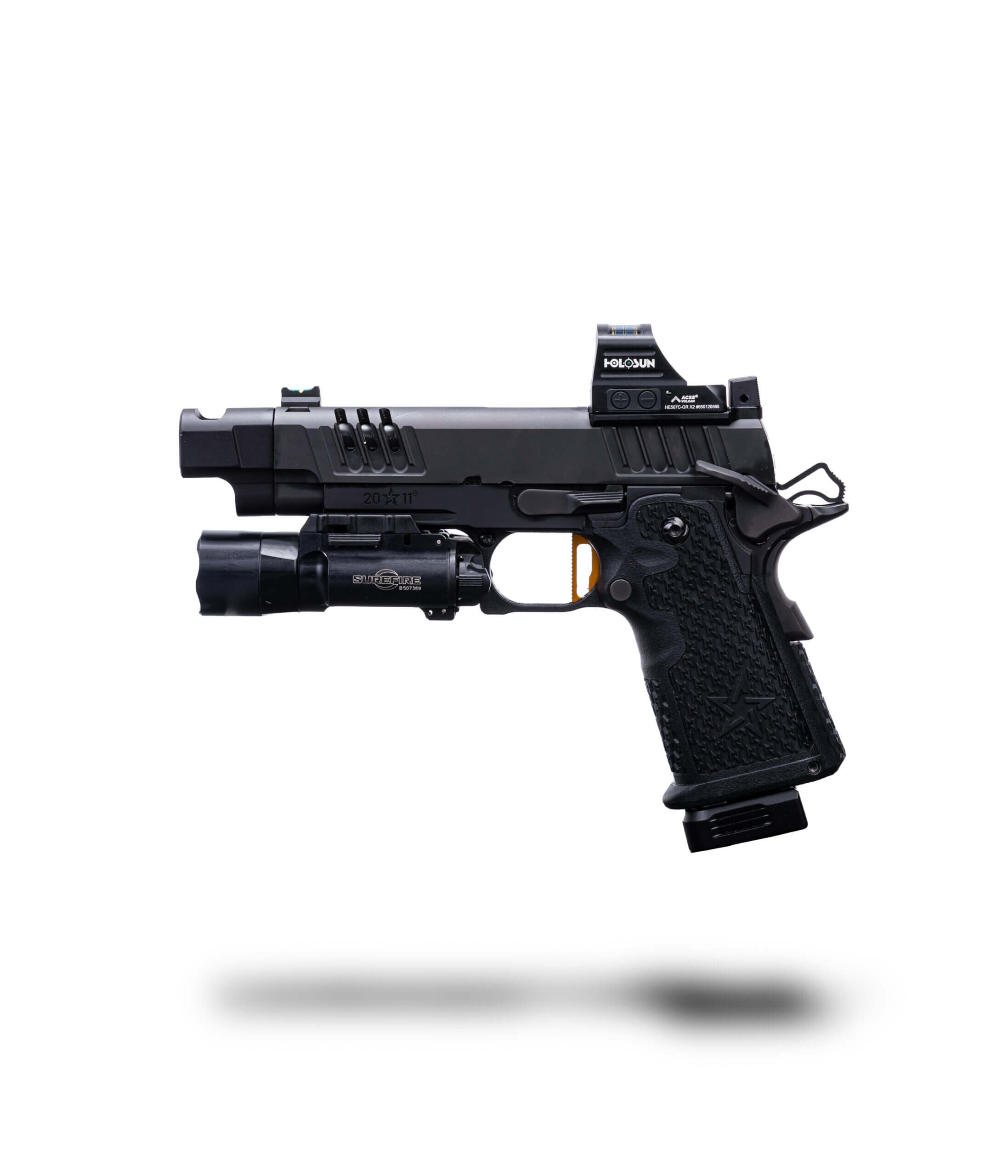 Staccato 2011 pistol with red dot optic, compensator and weapon light on a white background