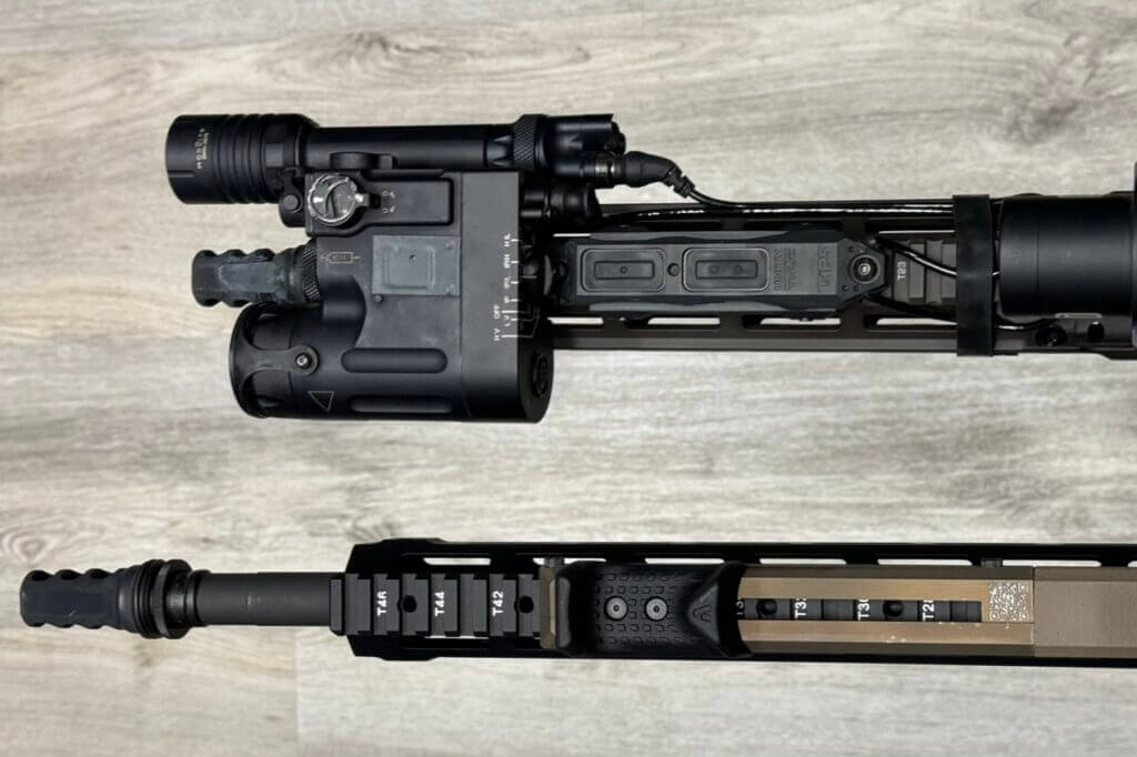 Two rifles with the DBAL-D2 and Unity Tactical pressure pad, as well as Antimatter Industries' new toy. 