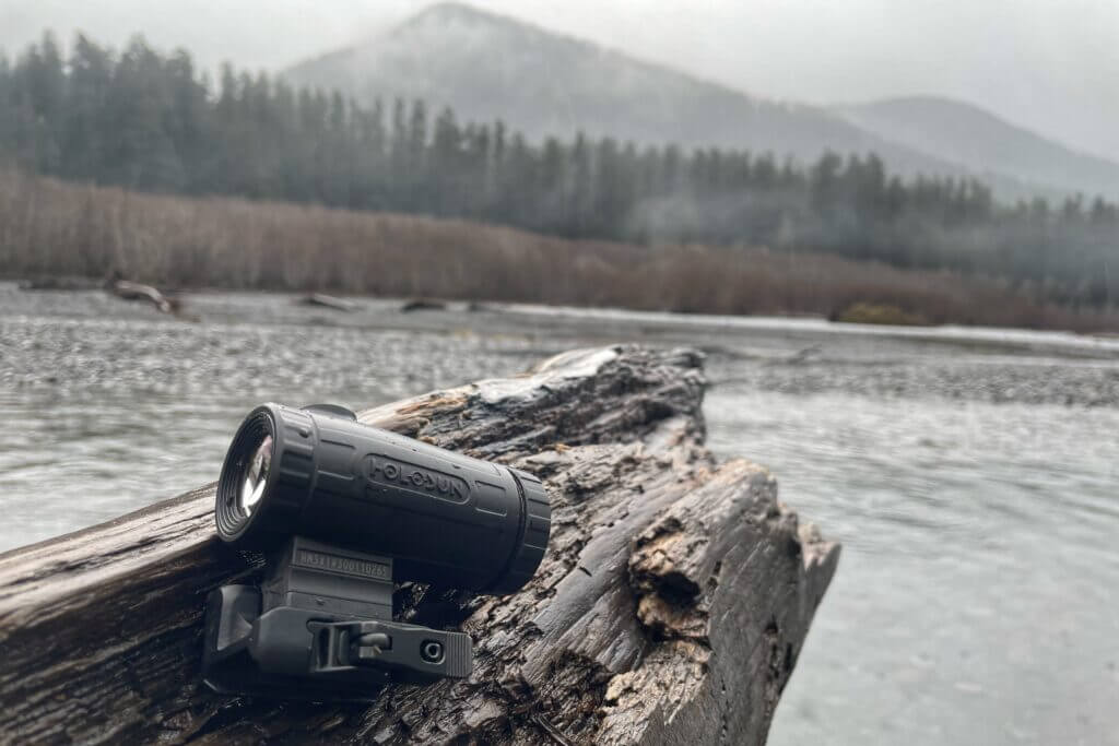 Holosun HM3XT on a log at a river