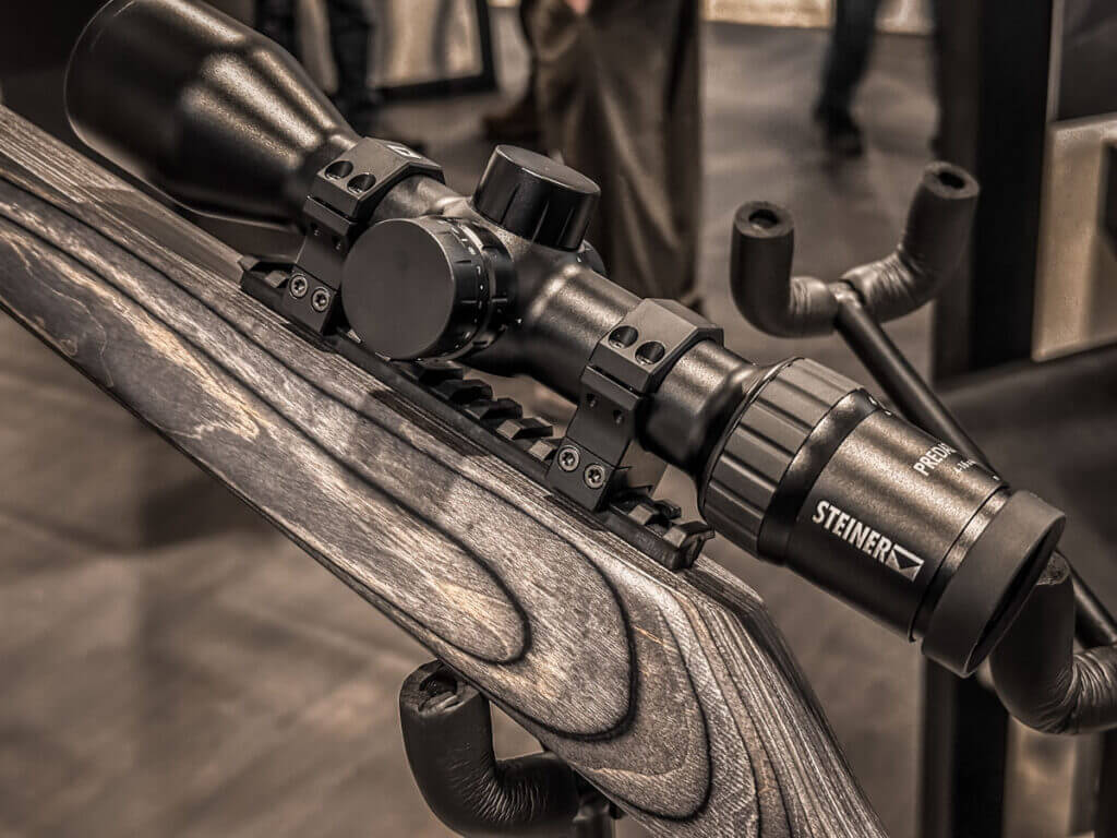 Closeup of a rifle scope.