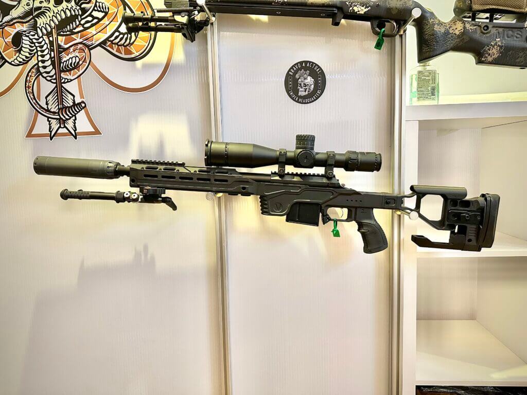 A rifle is displayed on the wall.