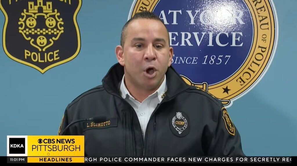 Chief Larry Scirotto announcing the changes at the podiumm.