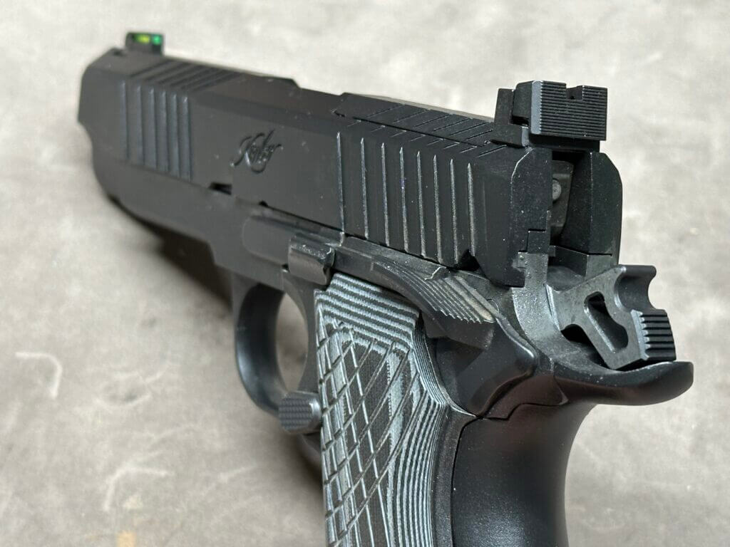 Closeup of the back of a Kimber KDS9C handgun.