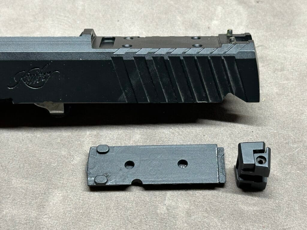 The Kimber KDS9C optics plate has been removed.