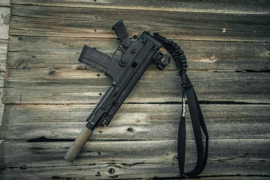 FN Scar 15P on a wooden background