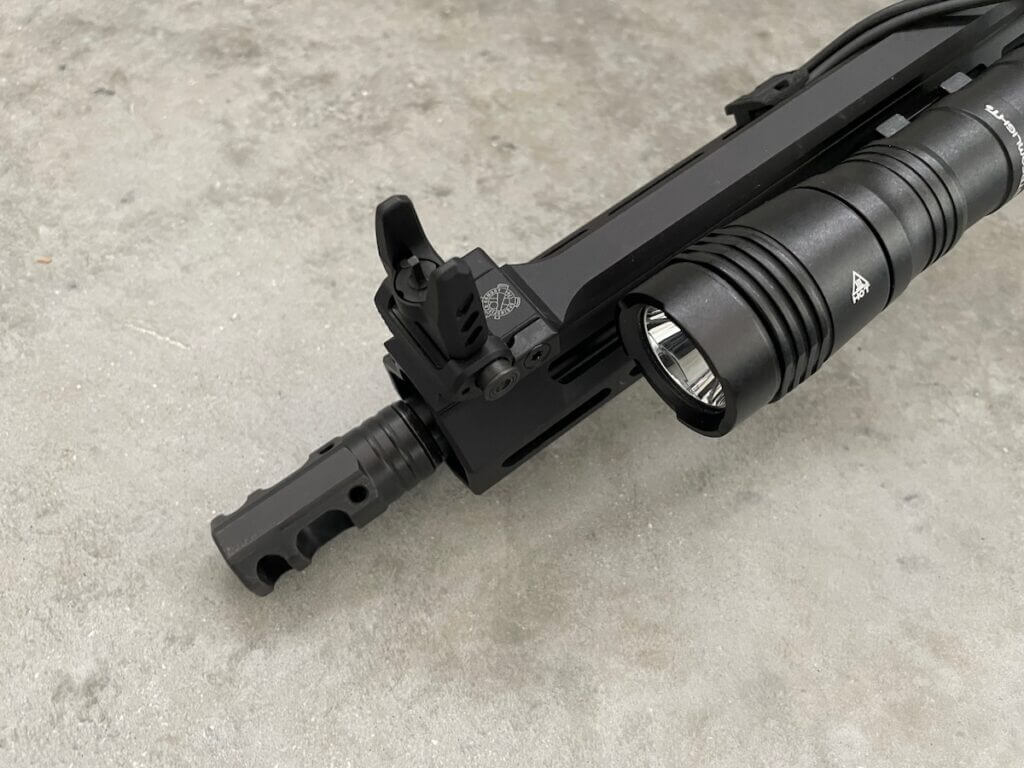 Tactical light mounted to MLOK rail.