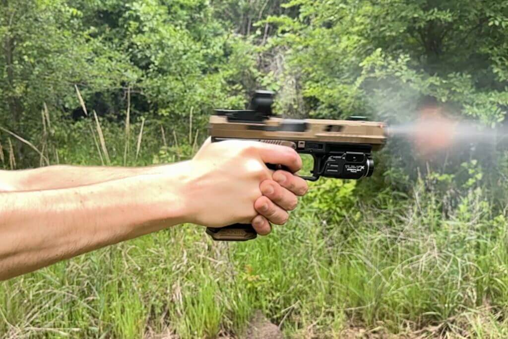 Shooting a Canik pistol with the Streamlight TLR-7 X installed