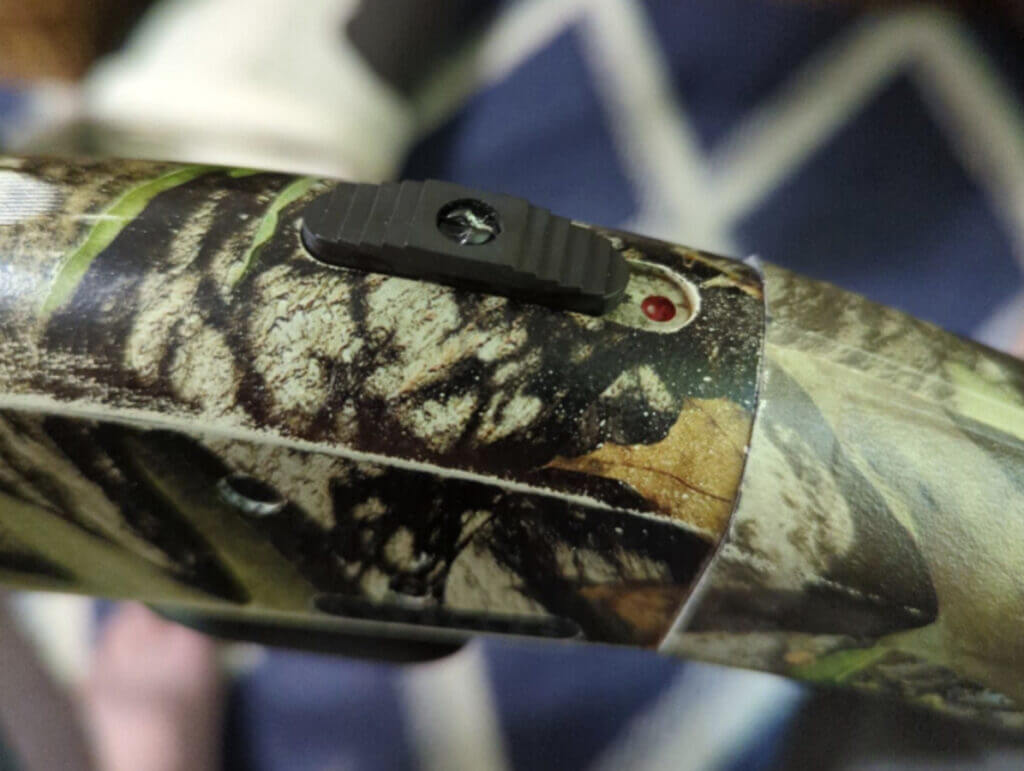 safety selector switch on a camo gun