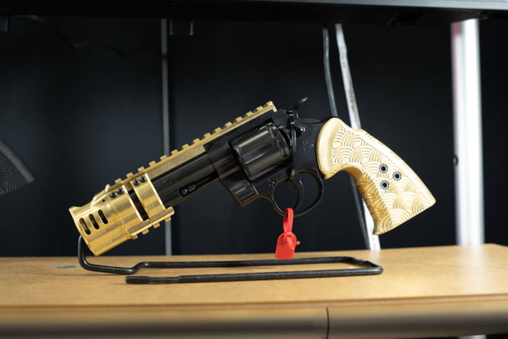 A Colt Python with a rail and muzzlebrake. 