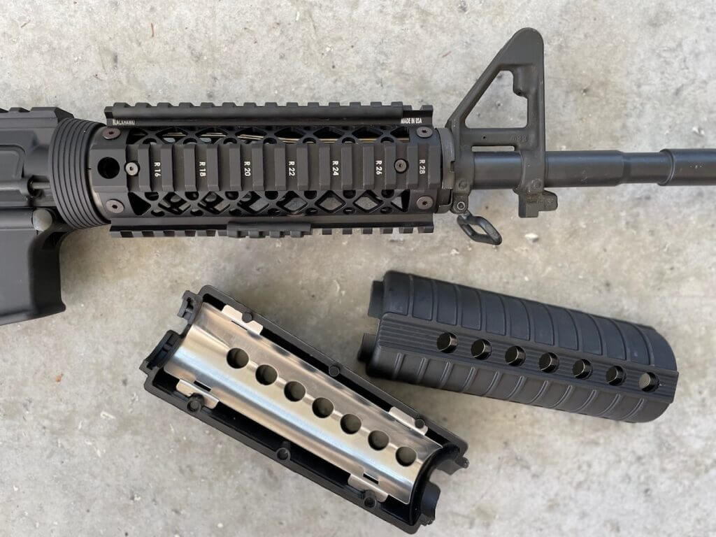 drop-in hand guards; an aluminum quad rail and polymer mil-spec