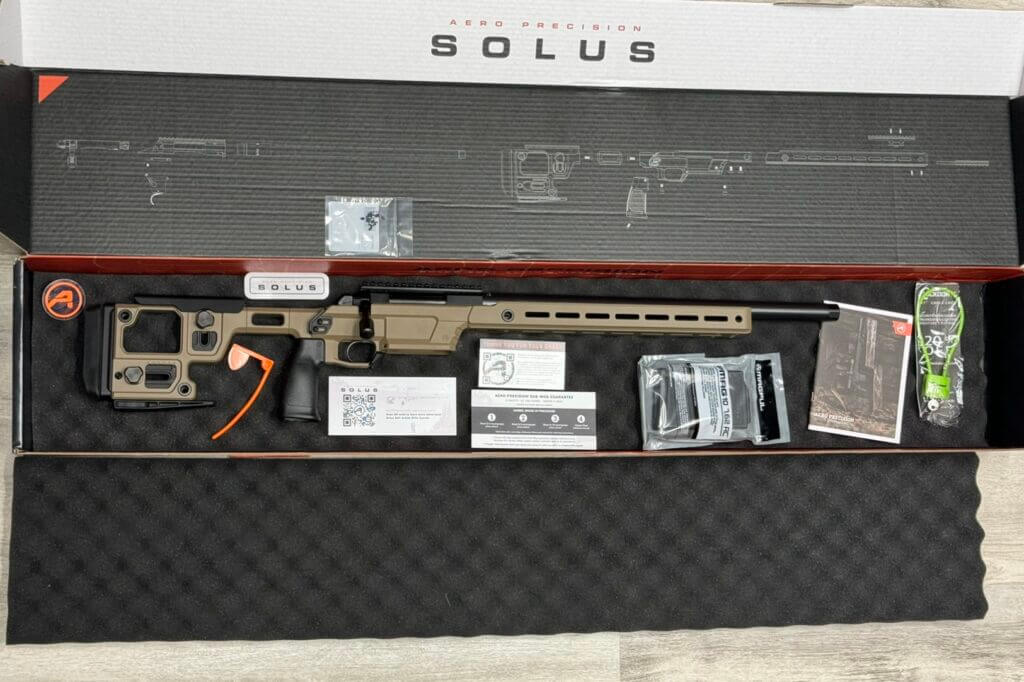 Solus rifle in box with included content