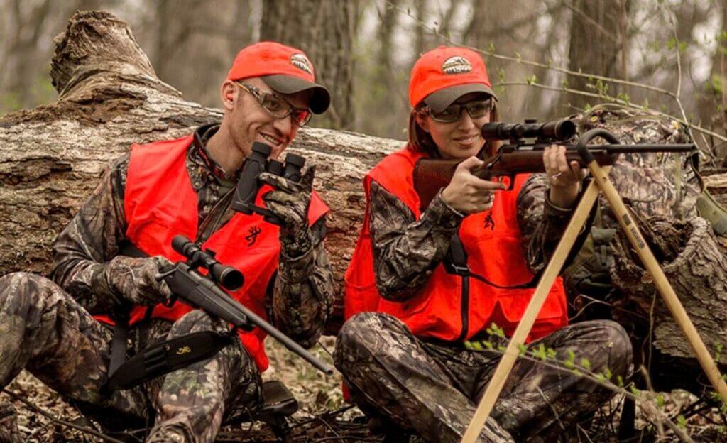 Two hunters in the field.