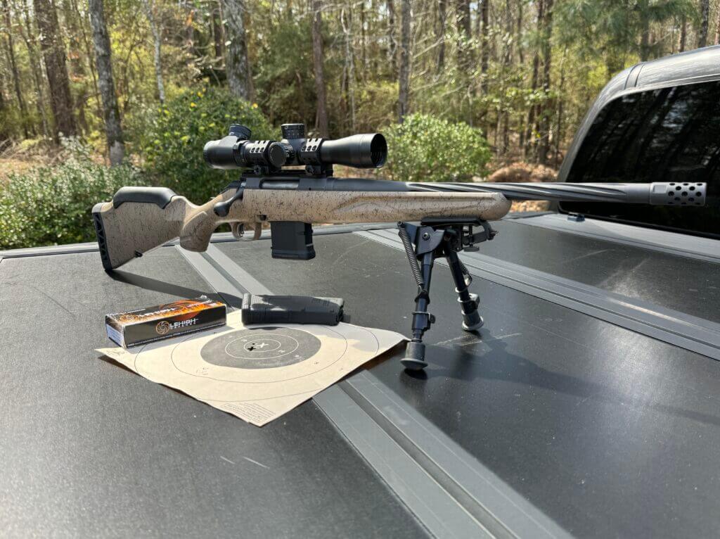 Ruger American II rifle with ammo and target