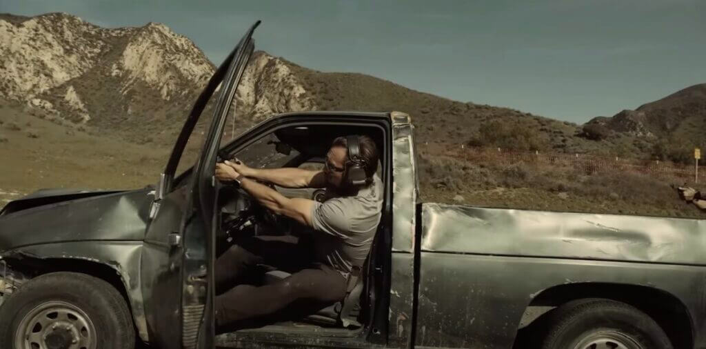 Navy SEAL shooting out a truck.