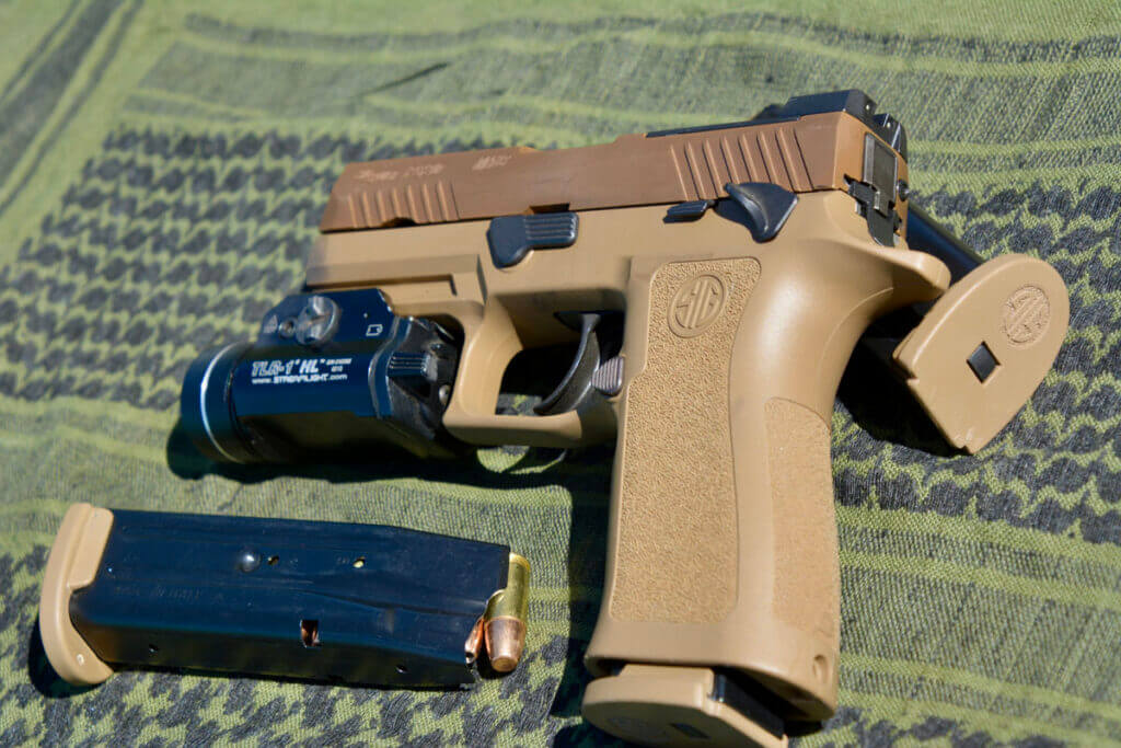 Sig Sauer handgun modified to be allowed in California with light installed