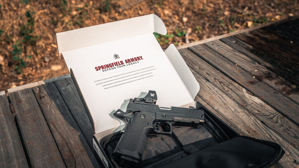 Springfield Armory Prodigy Comp laying on the box