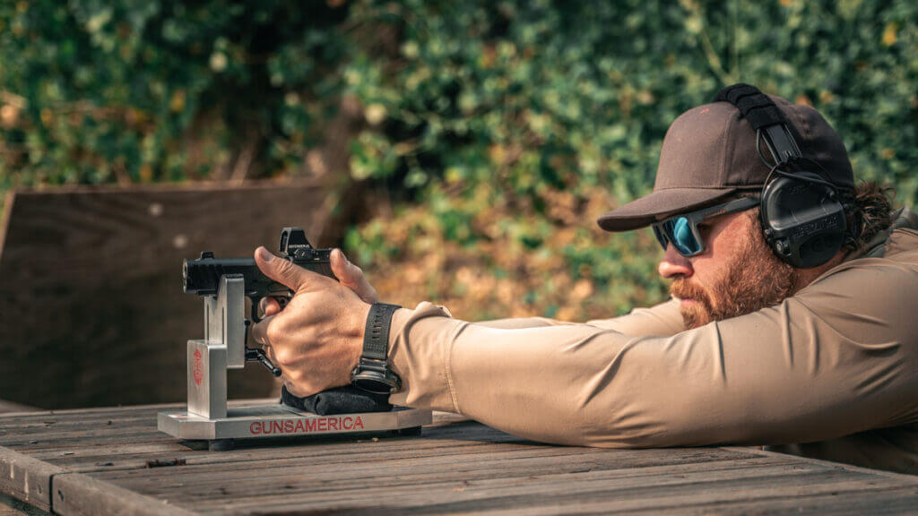 Springfield Armory Prodigy Comp with the author shooting over a rest