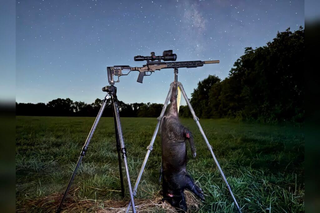 Christensen Arms MPR Rimfire on tripod in front of starry night sky