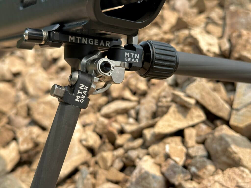 Closeup of a bipod's mechanical components.