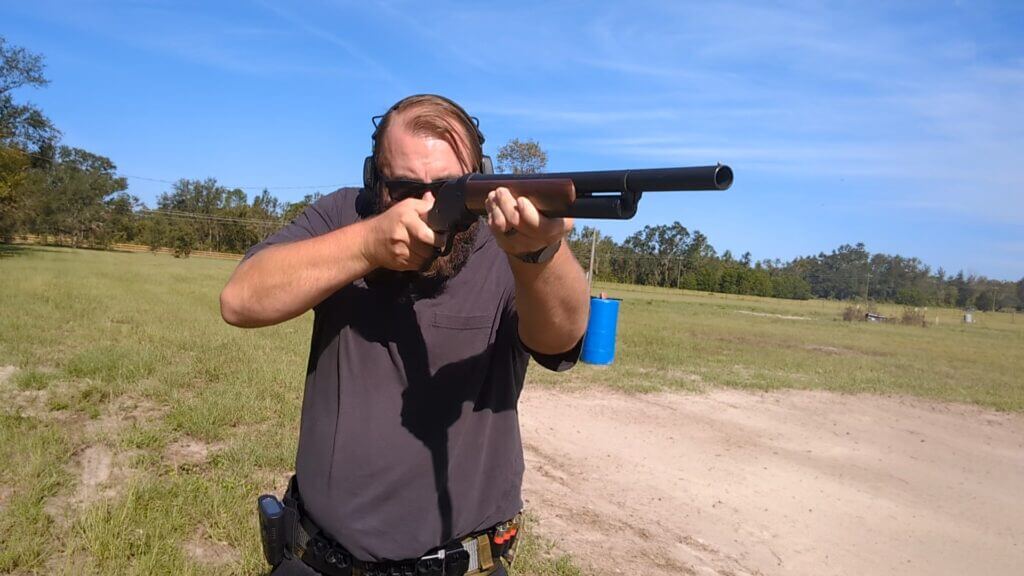 Man shooting Winchester 1887