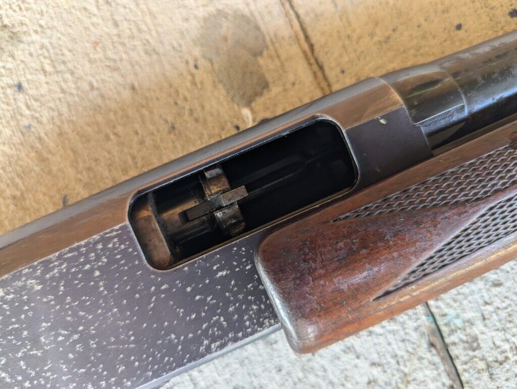 Rotating bolt on Winchester shotgun