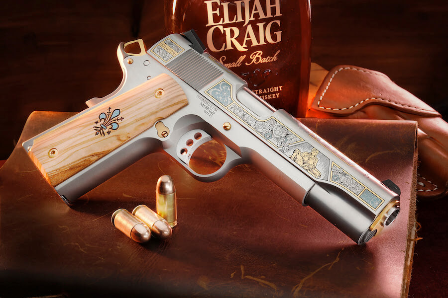 SK Customs Raphaello 1911, pictured with a bottle of bourbon.