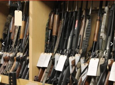 A rack of shotguns that are up for auction via the Minn. DNR.