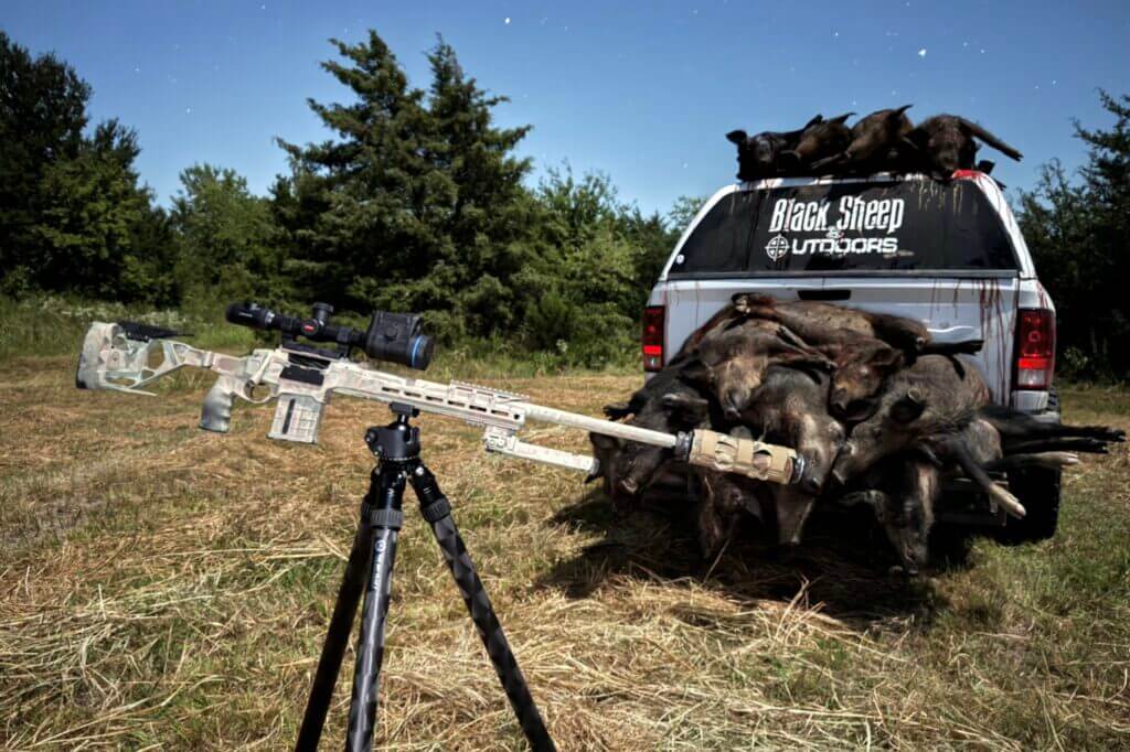 QDT V2 LS Inverted tripod  in front of white truck in field