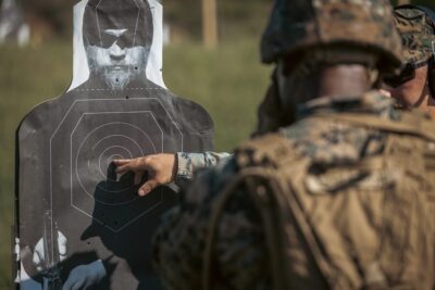 A Marine looking at a target.