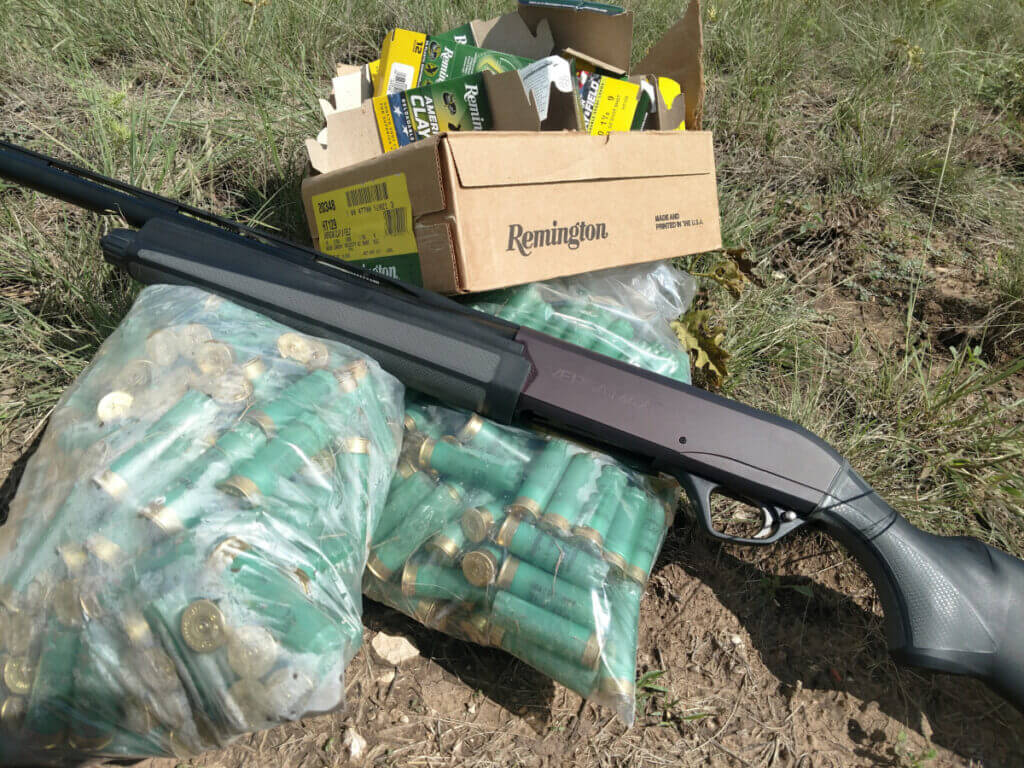 12-gauge shotgun on bags of empty shotshells