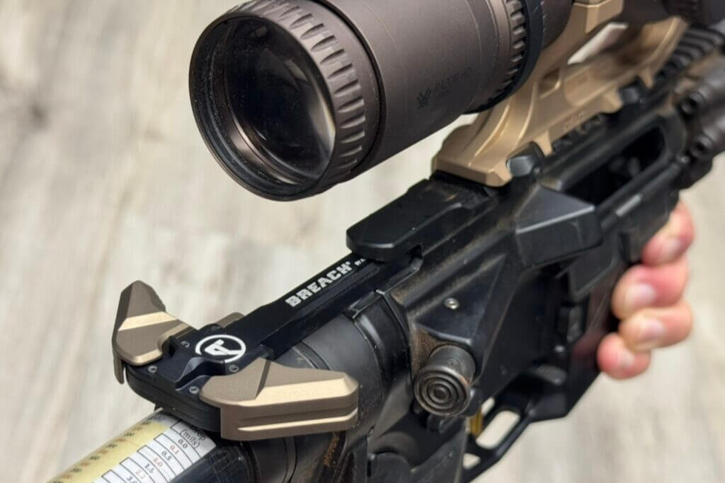 Breach charging handle installed on rifle