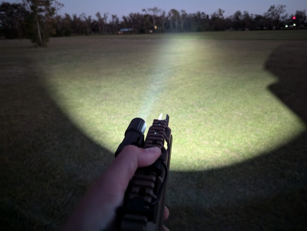 training with weapon light practicing activation and beam control