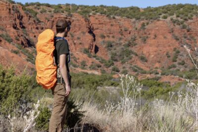 Mystery Ranch Pack Fly secured to the Metcalf 75