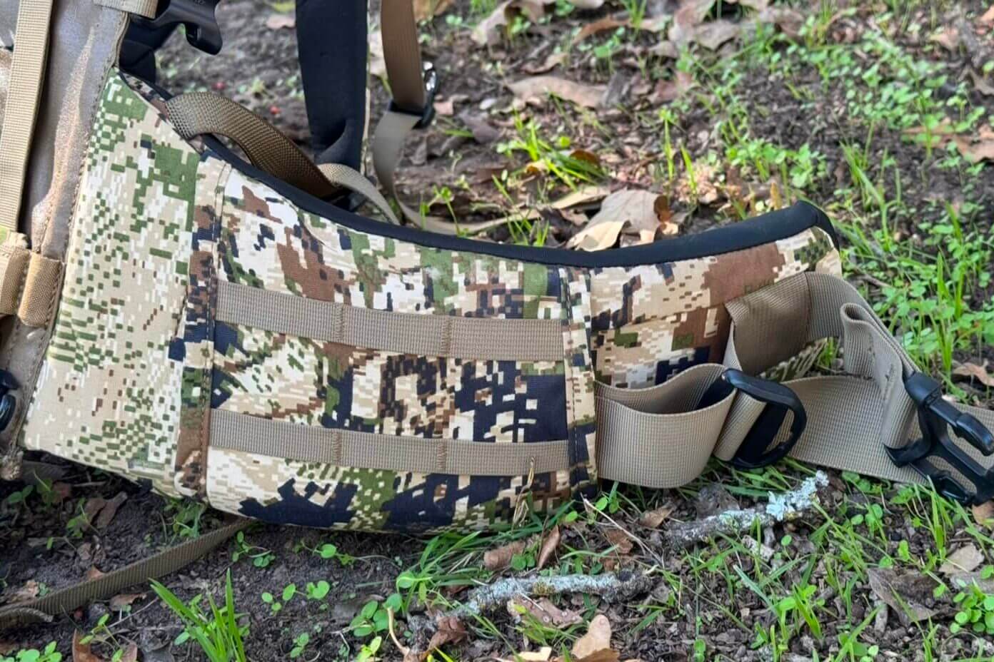 Hip belt with sewn loop attachment spots