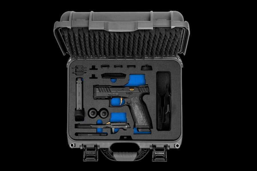 The Alien Remus pistol in its customized carry kit.