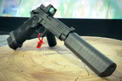 SilencerCo S98 is attached using a 3-lug mounting system and sits lower than cylindrical suppressors