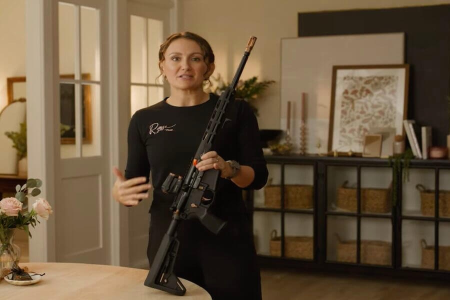 10x World Champion Lena Miculek holding a Rose M400 rifle.