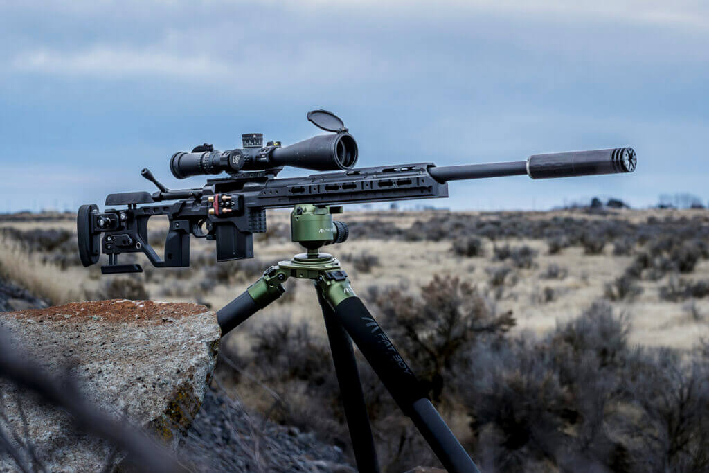 The Kinetic Research Group C-4 Chassis with Seekins Precision HAVAK action and 6mm creedmoor barrel, SilencerCo Omega 300, Nightforce ATACR 7-35x56mm Riflescope and Fat Boy Tripod