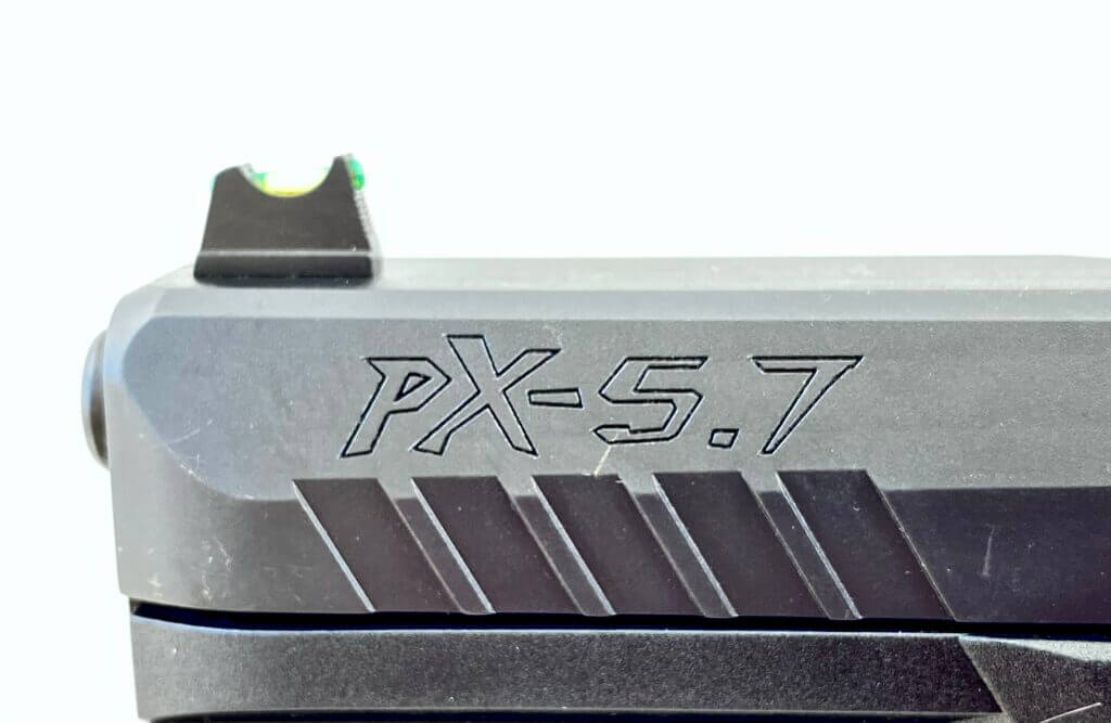 front iron sight and threaded barrel above engraving of PX-5.7 pistol