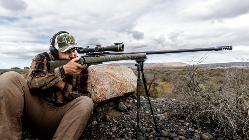 man and a rifle outdoors