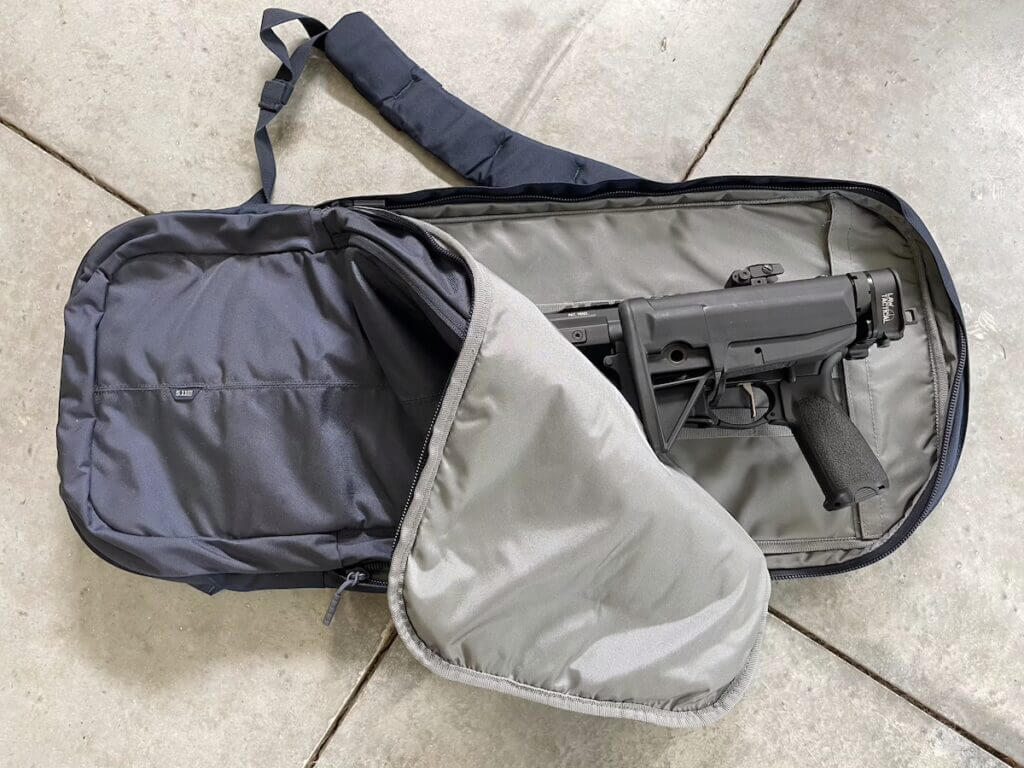 folded rifle in 5.11 discreet bag.