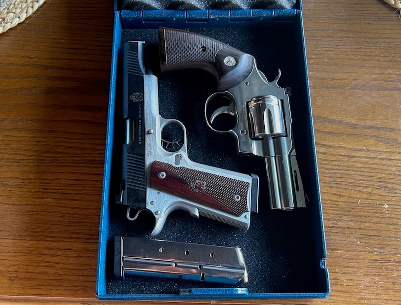 Two handguns—1911 and revolver—securely stored side by side in the Steelhead lock box.